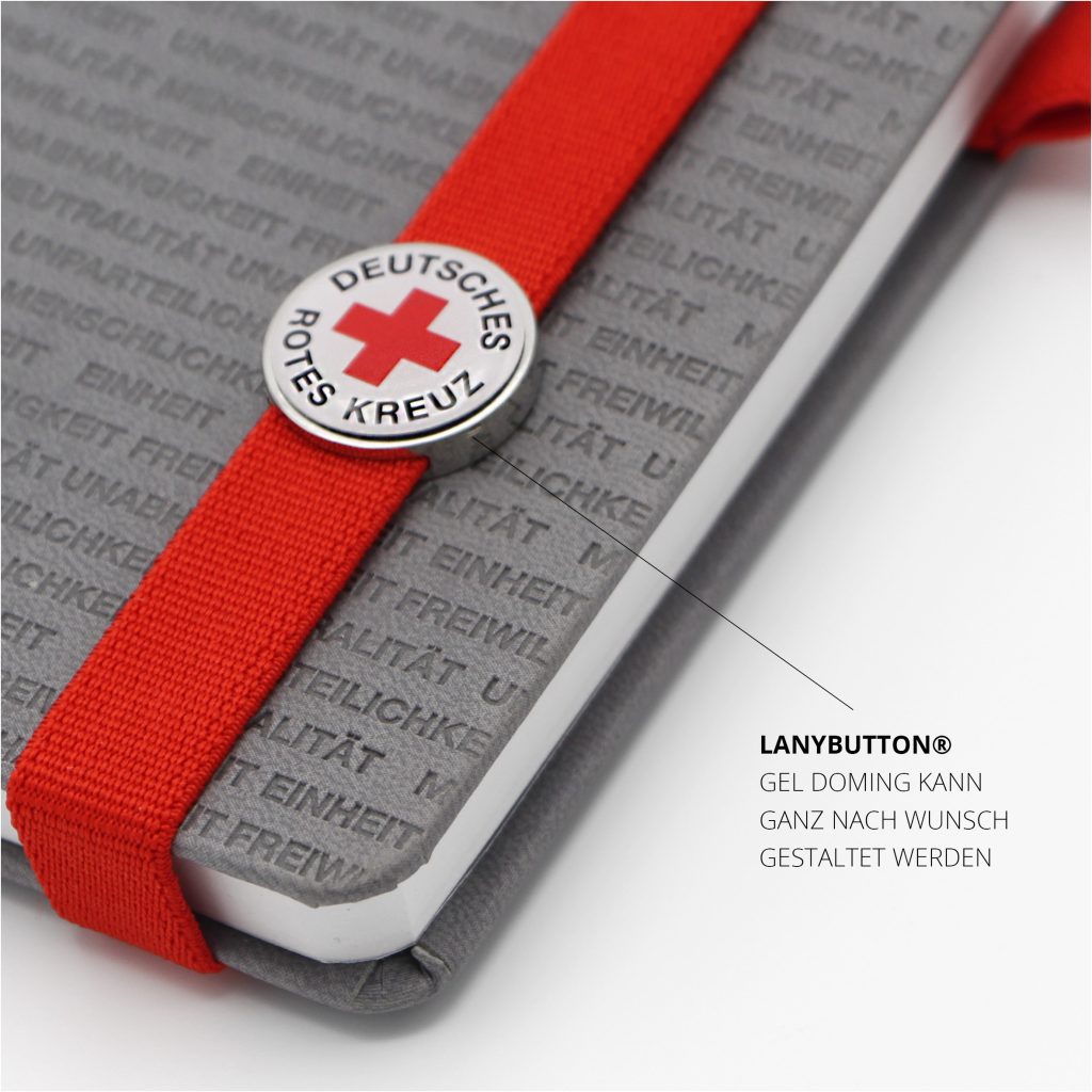 Lanybook® ProTouch A5 in Hellgrau mit rotem Lanyband und individuellem Lanybutton, Referenz Deutsches Rotes Kreuz